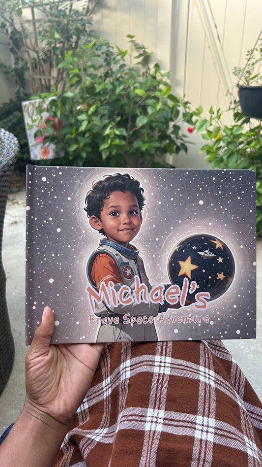 Hand holding a personalized storybook titled Michael's Brave Space Adventure